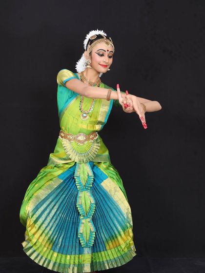 Saira Thomas, a student with a deep curiosity for the culture and mythology behind Bharatanatyam. Her thoughtful expression in this portrait reflects her intellectual engagement with the art form.