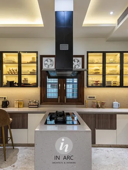 The kitchen is where memories are homemade. I designed this space to be a gathering place, balancing a modern modular layout with warm, inviting details like backlit cabinetry and an island for family and friends to gather around.