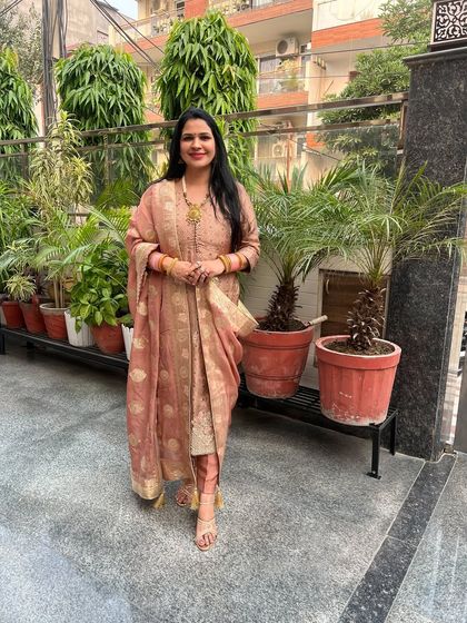 Another view of the mauve suit, showing the beautiful drape of the Banarasi dupatta. Creating outfits from scratch allows you to play with such rich fabrics.