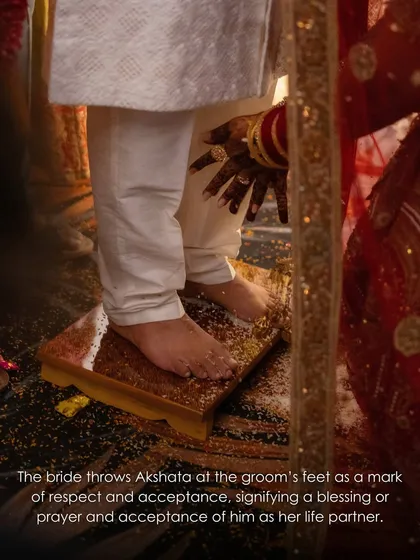 As a mark of respect and acceptance, the bride throws Akshata at the groom's feet. We help families honor these intricate details of their wedding traditions.
