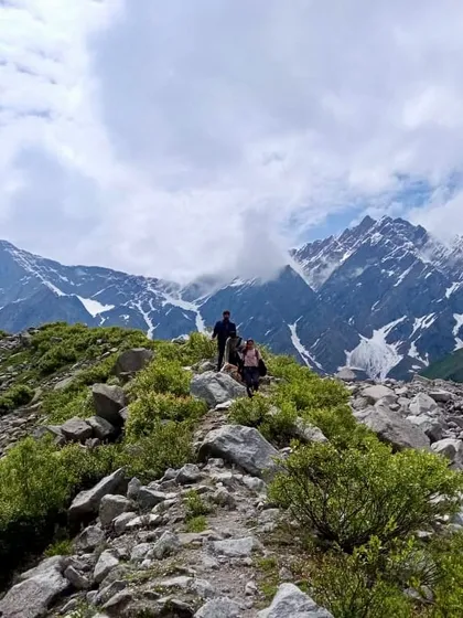 The rocky terrain near Beas Kund, with the mighty Pir Panjal range in the background. Every step is an adventure here.