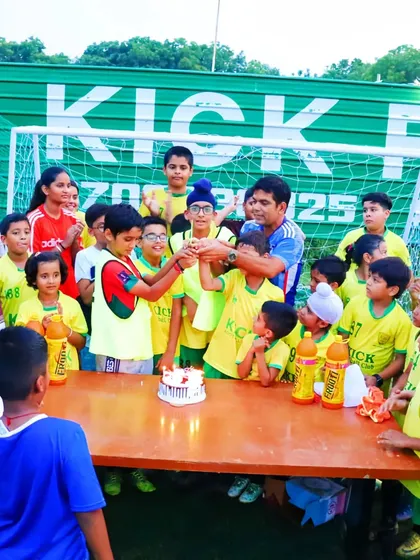 The whole team gathers to cut the cake for our August birthday celebration.
