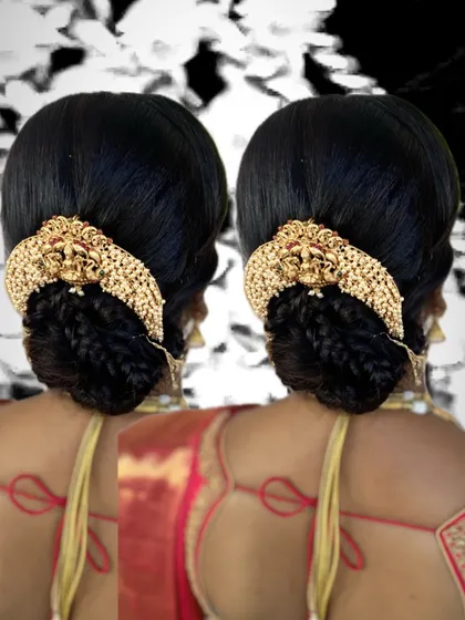 A creative and elegant bun hairstyle for a traditional event. The braided details and the large temple-style hair accessory create a very regal and sophisticated look.