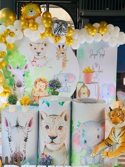 A close-up of the beautiful watercolor animal illustrations used in this jungle theme.