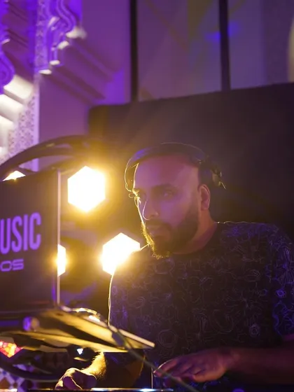 A close-up shot of me on the decks in Marrakech. In this moment, it's just me and the music, feeling the beat and getting ready to drop the next track.
