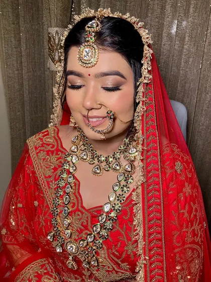 Sonakshi looked so glowing and ethereal. I loved dolling her up in this classic red lehenga, creating a look that was both traditional and radiant.