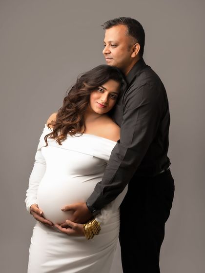 A moment of quiet comfort and support. I love capturing these gentle embraces that show the deep bond between expecting parents.