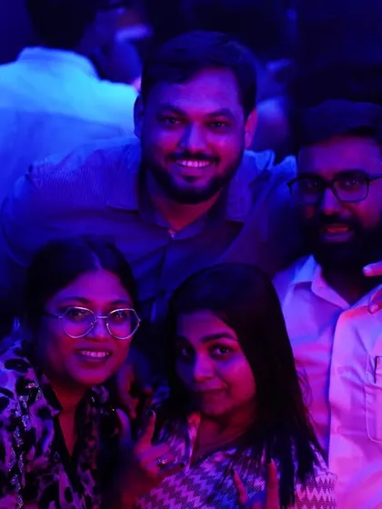 A group photo with some of the partygoers. I love connecting with the people who come to my shows.