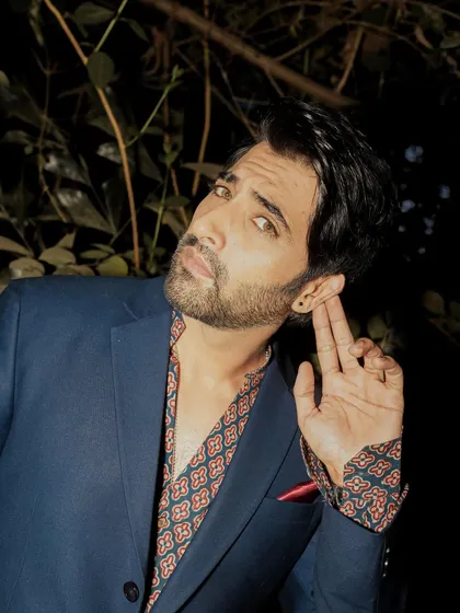 A close-up that captures an expressive, listening pose, adding a narrative element to the shoot.