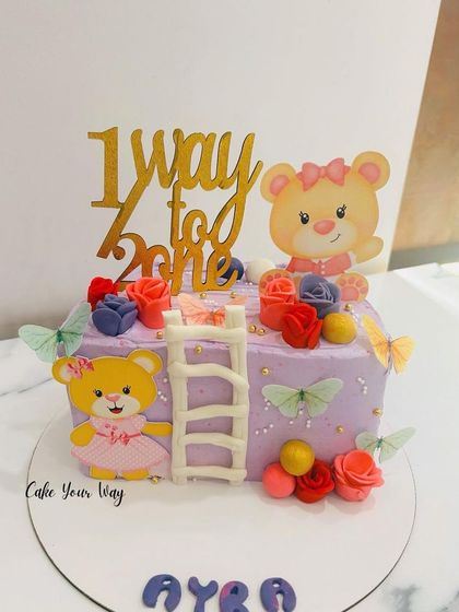 Six months of giggles and grins. A cute "1/2 way to one" cake.