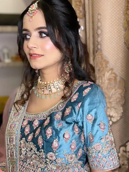 Another angle of this gorgeous party look. The soft curls and the elegant jewelry complete the ensemble perfectly.
