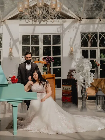 Another creative use of props at Picture Villa. The piano and soft smoke effect add a layer of dreamy romance to this intimate moment between the couple.