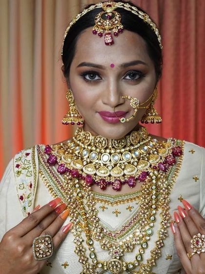 A full-length view of the bride, showing how our comprehensive rental sets create a stunning head-to-toe look.