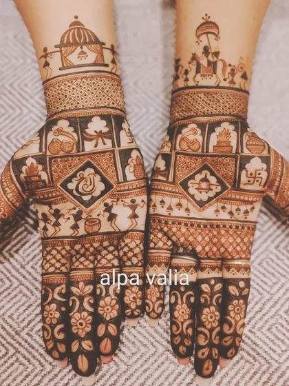 This unique bridal design tells a complete wedding story using Warli art. It features motifs of the baraat, doli, shehnai, kalash, and the wedding ceremony itself.