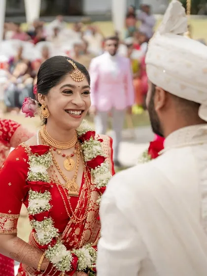 The best part of my job is seeing these happy, candid moments. This bride's joyful expression during her wedding ceremony shows how confident and beautiful she feels, which is always my ultimate goal.