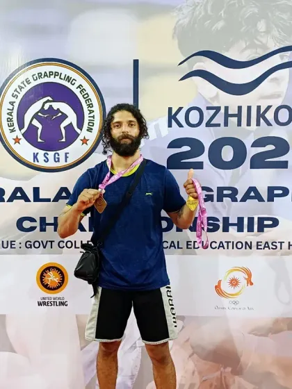 I don't just talk about training like an athlete, I live it. Here I am after winning two gold medals in the Kerala State Grappling Competition. My methods are tested and proven in real competition.