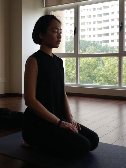 A moment of quiet mindfulness. Seated meditation is woven into our classes to help still the fluctuations of the mind.