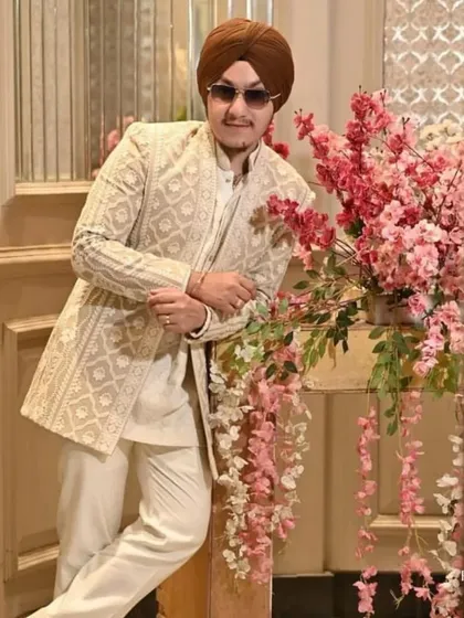 Our client, Gkirat, looking dapper in a bestselling Indo-Western ensemble. The outfit's clean lines and detailed embroidery are perfect for making a stylish statement.