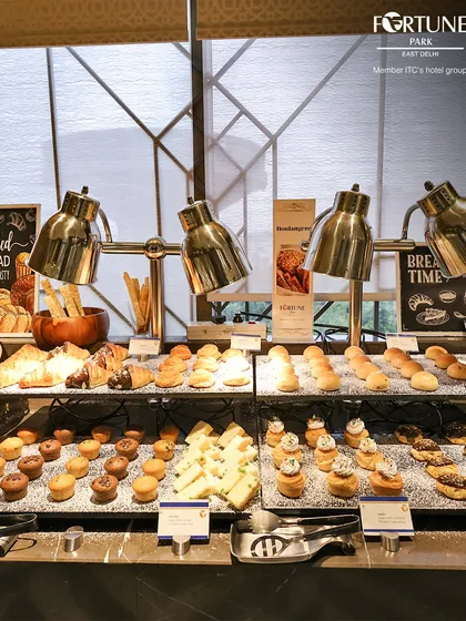 The full view of our extensive bread and pastry counter, a paradise for anyone with a sweet tooth.