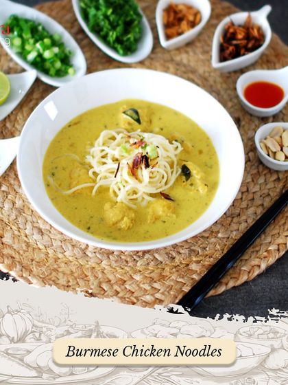 A comforting bowl of Burmese Chicken Noodles (Khao Suey). This dish, with its rich coconut curry and array of toppings, is a popular choice from our Pan-Asian menu.