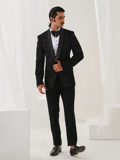 Another view of the Nazaakat velvet tuxedo, demonstrating its sharp tailoring and classic appeal.