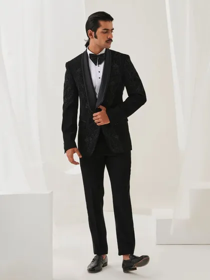 Another view of the Nazaakat velvet tuxedo, demonstrating its sharp tailoring and classic appeal.