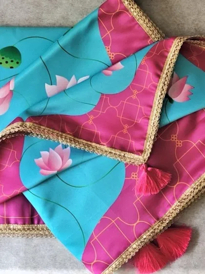 This beautiful lotus-print fabric can be used to create custom antarpats, thal covers, or even as part of your hamper decor. I love incorporating such vibrant prints into my work.