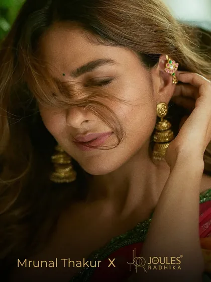 True elegance is often found in subtlety. Mrunal Thakur wears our Alayaa earcuff and jhumkas, a perfect example of how traditional motifs can be styled for a contemporary, understated look that is both chic and timeless.