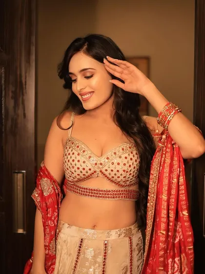 The complete look, showcasing the beautiful embellished lehenga. My goal was to create a makeup style that enhanced her natural beauty without overpowering the stunning outfit.
