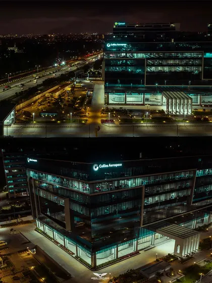 A crisp, dual-panel night view of the Collins Aerospace building, highlighting its illuminated branding and the surrounding road network. This shot is a testament to our expertise in night-time aerial photography.