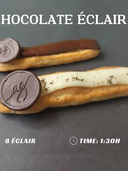 My chocolate éclairs are a classic French dessert. I make them with a light choux pastry, a luscious pastry cream filling, and a delectable chocolate glaze, finished with my signature chocolate seal.
