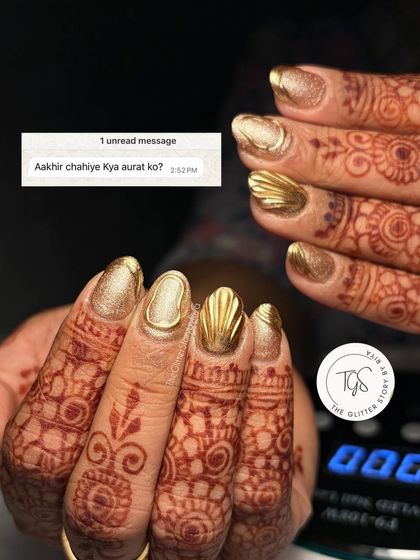 Sometimes, all a woman wants is the perfect set of nails for her big day. This meme-style shot shows off the final result of a stunning gold chrome bridal manicure.