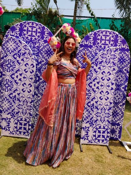 Bringing the fun and energy to a sunny Haldi carnival. My colorful outfit matches the vibrant and playful mood of the day.