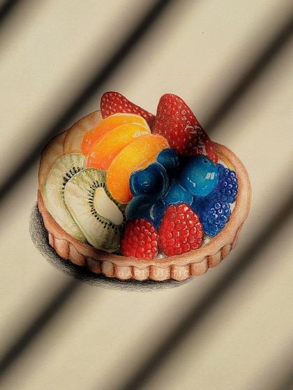 An artistic shot of the fruit tart drawing with shadows cast over it.