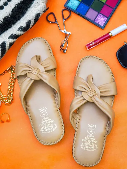 A vibrant and energetic flatlay for a footwear brand. Using a bold background and relevant props like makeup and accessories, this image tells a story about the customer's lifestyle, making it highly effective for Instagram marketing.