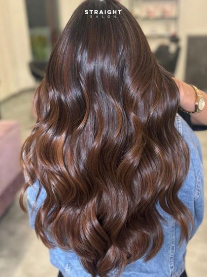 A stunning back view of the balayage, showcasing the length, volume, and expert color blend.