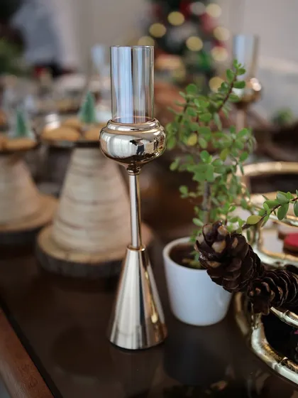 A single tube from our Vesper Quintet candle holder, shown here as a standalone piece. Its elegant design makes it a stunning centerpiece even on its own.