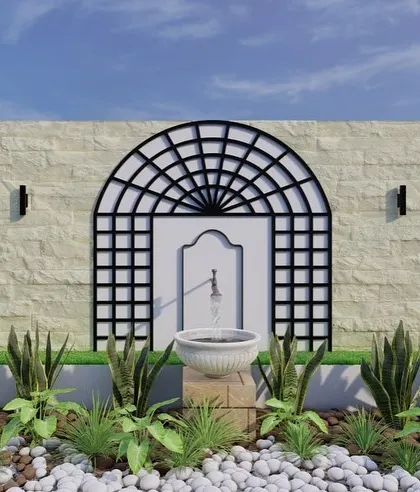 This is a design concept for a long planter box that wasn't getting enough sunlight. I added shade-loving plants and created a feature wall with decorative metal trellises and a central fountain to make it a beautiful view from the living room.