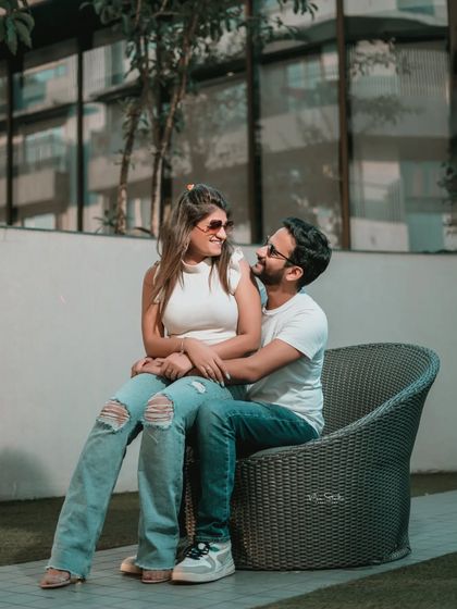 A candid shot filled with laughter and connection. I always look for these unposed moments where the couple's true personalities shine through.