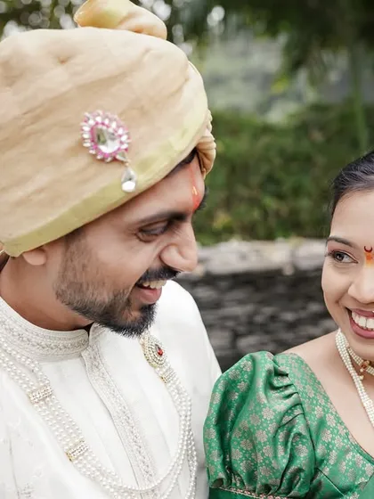 The quiet moments between rituals are often the most telling. Here, we captured a candid, loving glance between Abhimanyu and Ketaki during their Maharashtrian wedding, a simple look that speaks volumes about their bond.