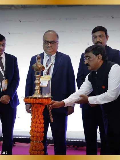 A key moment from our inauguration ceremony, as a dignitary lights the ceremonial lamp. This tradition symbolizes the illumination of knowledge and the bright future of the lighting industry.
