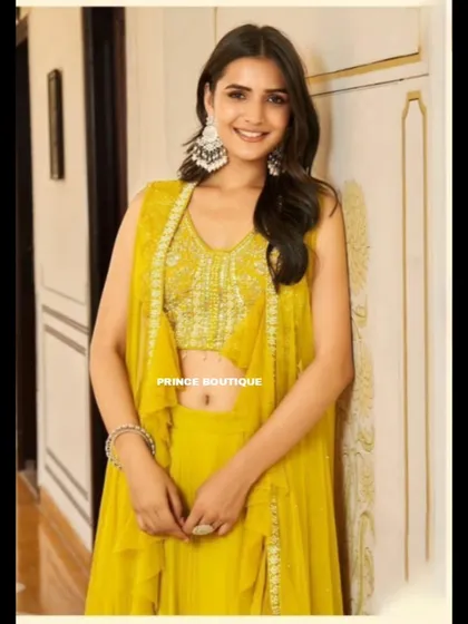 Another happy client in the yellow ruffled outfit, proving it’s a popular and beloved choice for festive events.