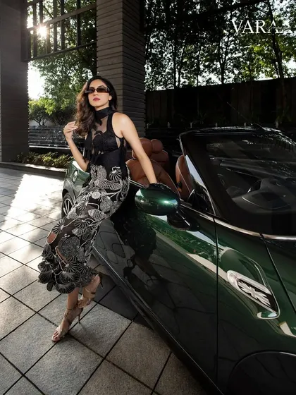 Styling for the cover of Varaa Bridal Magazine with the talented Ritu Varma. This look was all about modern glamour, pairing a unique black embroidered dress with a classic convertible for a chic, sophisticated shot.