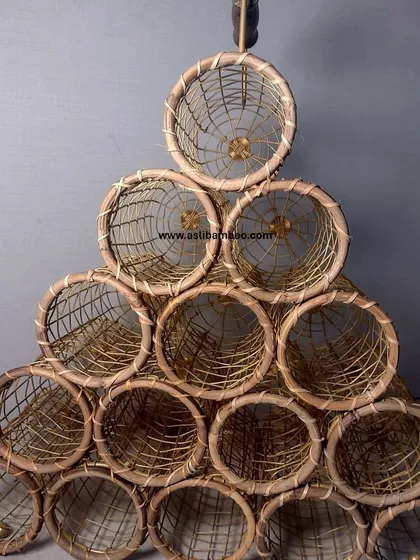 A larger version of our pyramid wine rack, capable of holding fifteen bottles. This freestanding piece is both a functional storage solution and a sculptural element for any wine lover's home.