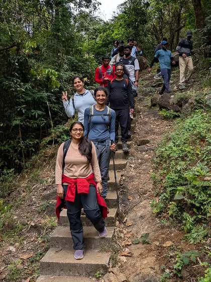 The group climbing the stone steps that are part of the initial ascent on the Kumaraparvatha trail.