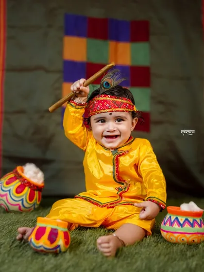Look at this little Kanha! Themed baby photoshoots for festivals like Janmashtami are so much fun. My focus is on making the baby comfortable and capturing their delightful expressions, creating adorable memories for the parents.