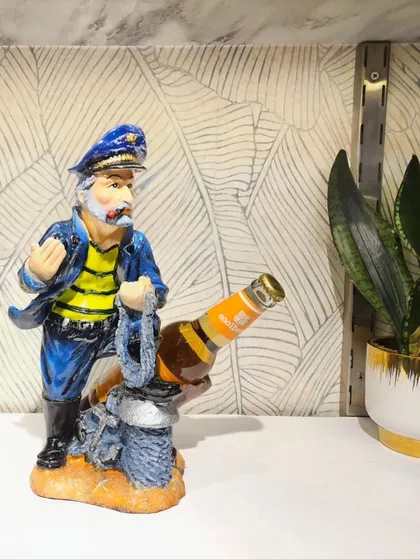 Another sailor design, ready to hold a bottle in a cannon-like pose.