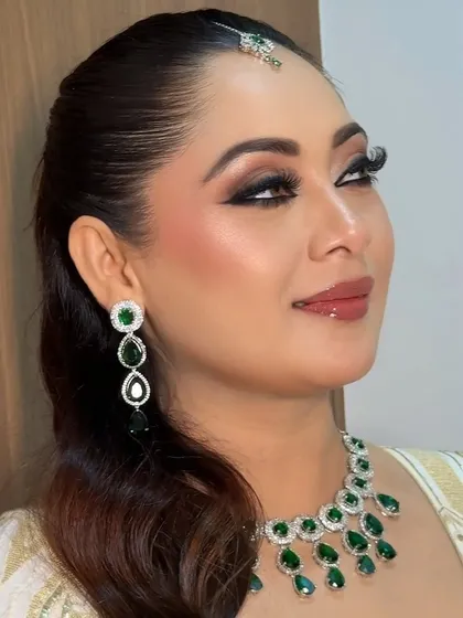 A close-up of Razia's elegant Nikkah look. I created defined kohl eyes and radiant, dewy skin, finished with a natural lip and soft blush for a graceful style.