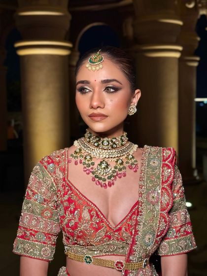 A side profile showcasing the sharp, defined contour and the intricate details of the eye makeup. This angle highlights how the look is structured to be beautiful from every perspective.