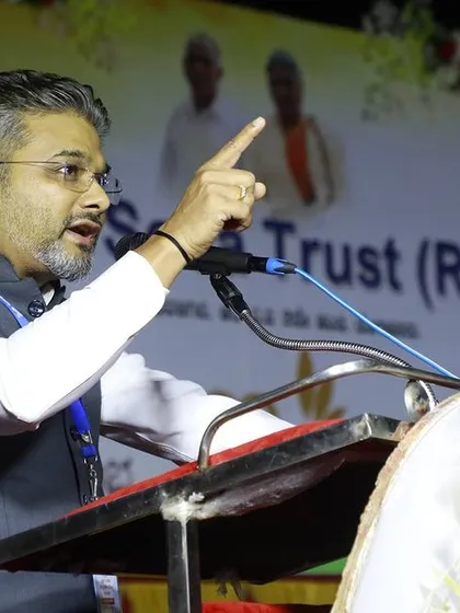 Addressing a large gathering of students in Shikaripura for the MY SEVA Trust. I believe that empowering the next generation with knowledge and a strong sense of purpose is crucial for our nation's future. Public speaking allows me to share my experiences and encourage young minds to build a better Bharat.